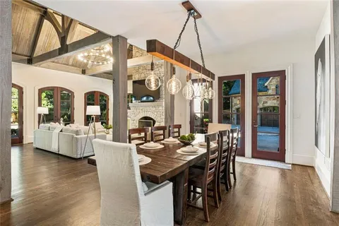 a bathroom with a sink a mirror and a vanity