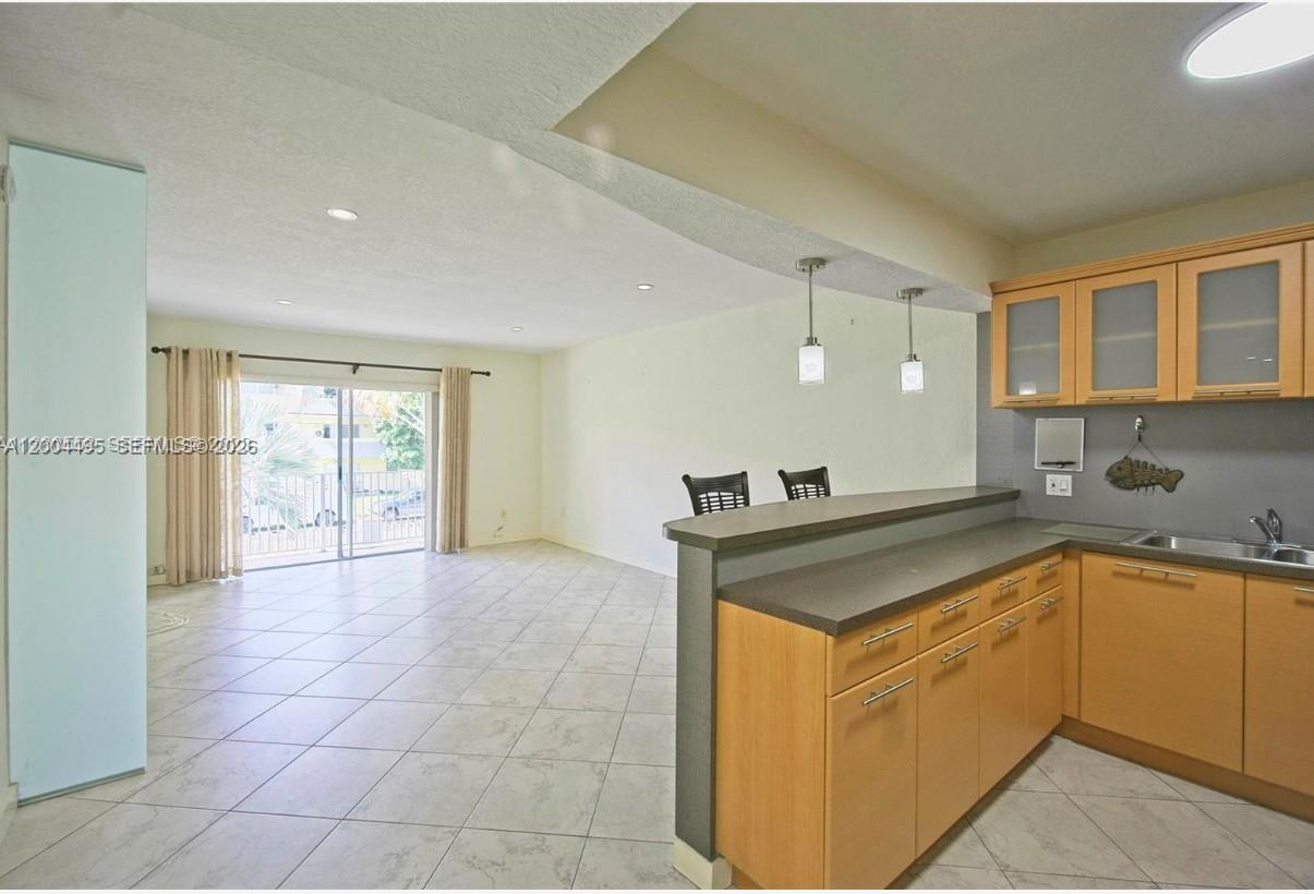 7401 Southwest 82nd Street, Unit 207S Miami, FL 33143 - Photo 2 of 15 a view of a kitchen counter space with sink
