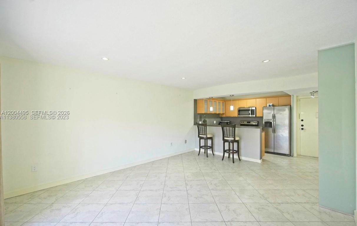 7401 Southwest 82nd Street, Unit 207S Miami, FL 33143 - Photo 5 of 15 a view of a hallway with seating area