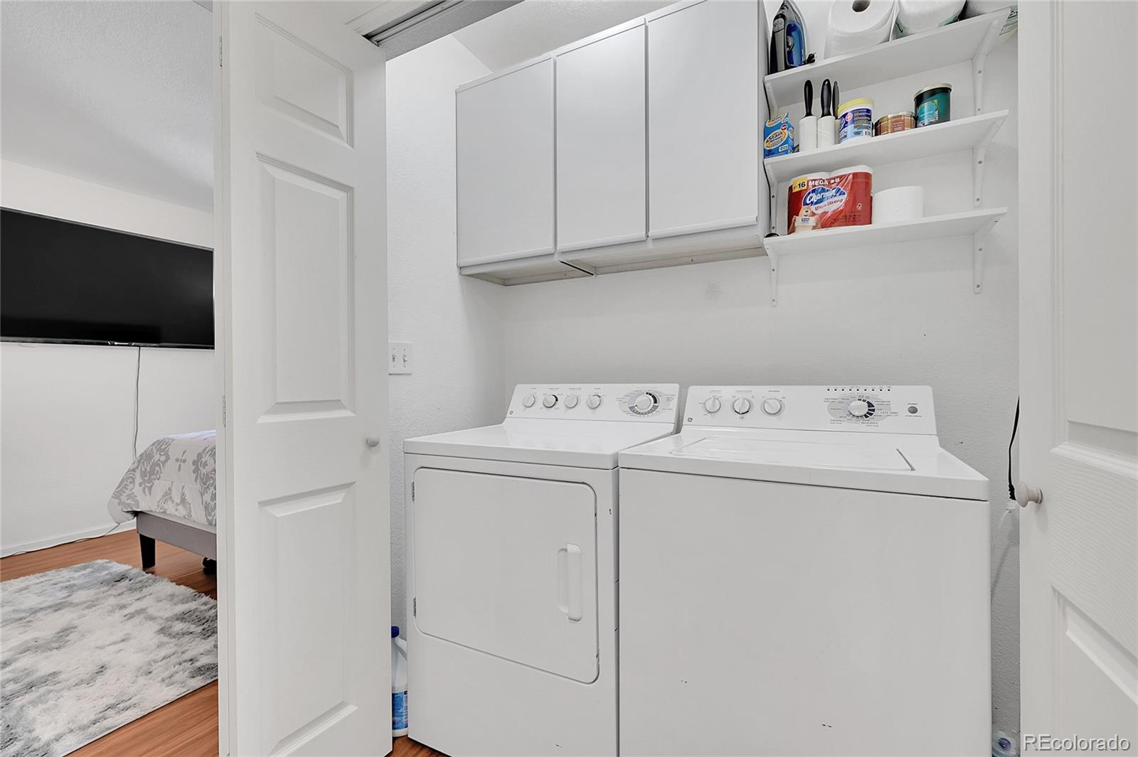 1489 Hummingbird Circle Brighton, CO 80601 - Photo 22 of 46 a utility room with dryer and washer