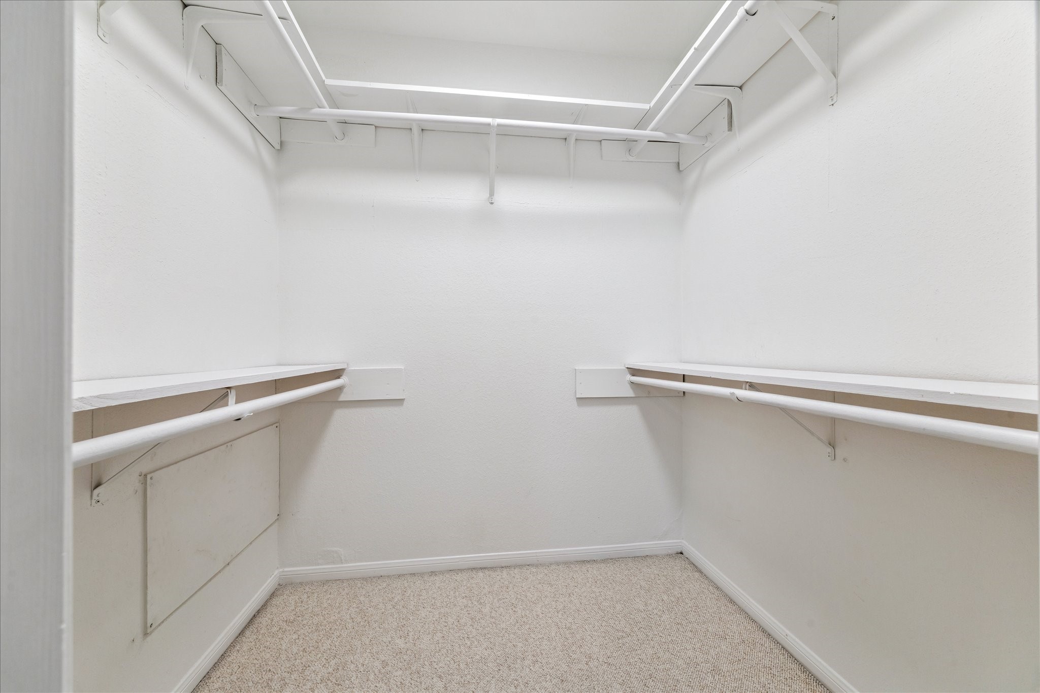 1201 Bering Drive, Unit 100 Houston, TX 77057 - Photo 16 of 20 a view of an empty walk in closet