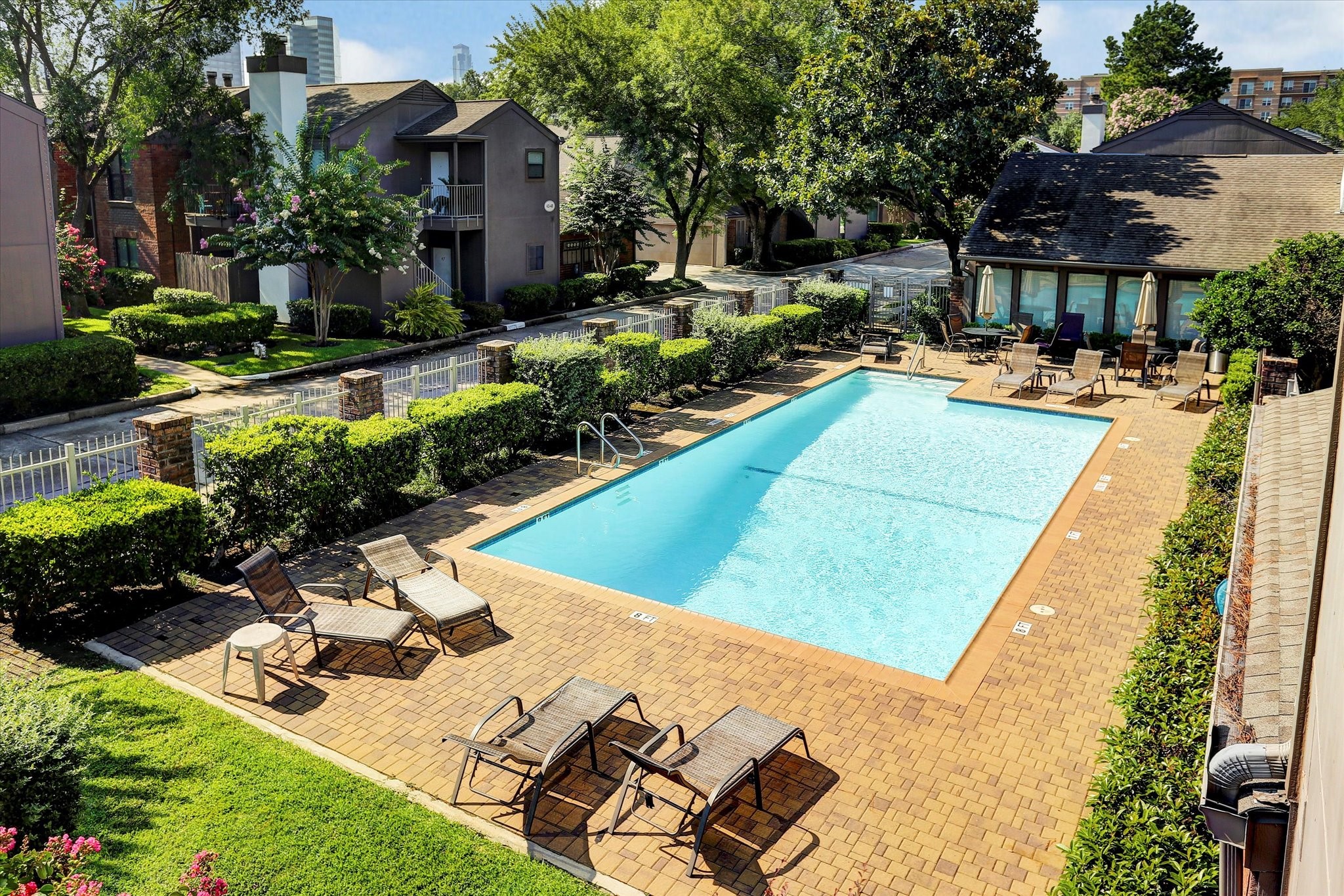 1201 Bering Drive, Unit 100 Houston, TX 77057 - Photo 19 of 20 a view of a swimming pool with a patio
