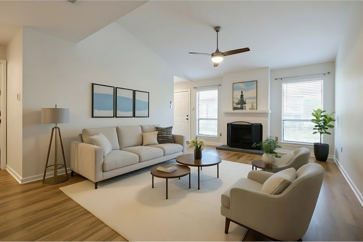 1201 Bering Drive, Unit 100 Houston, TX 77057 - Photo 3 of 20 a living room with furniture a fireplace and a potted plant