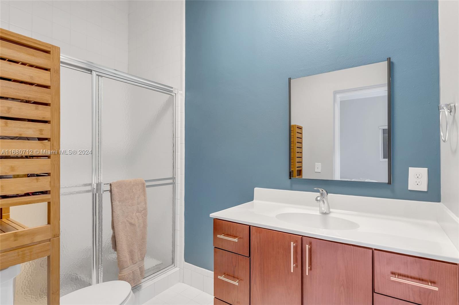11451 Southwest 103rd Street Miami, FL 33176 - Photo 11 of 23 a bathroom with a sink toilet and shower