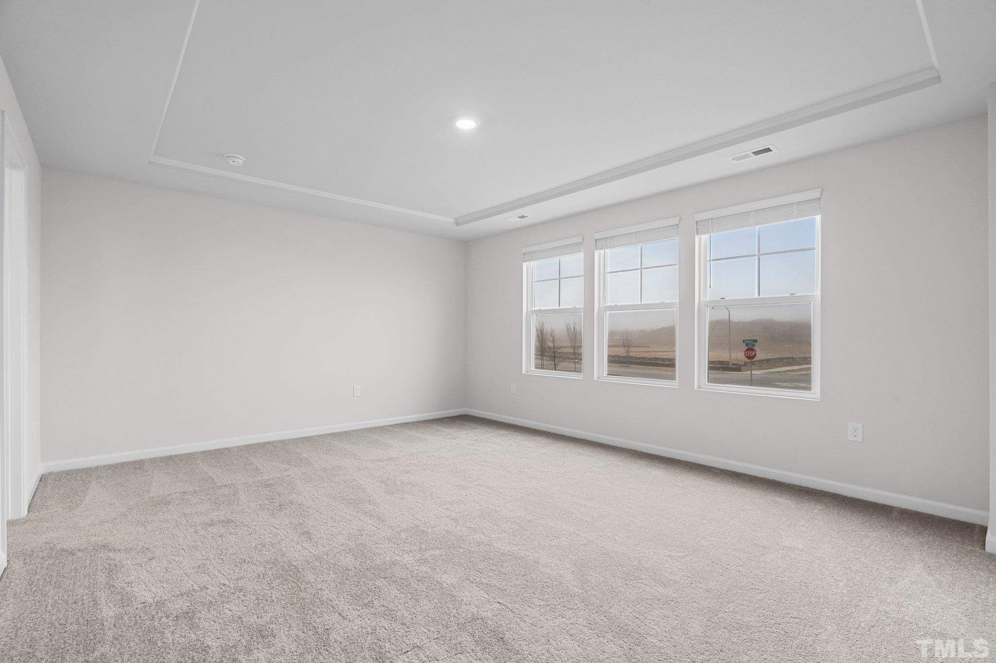 5060 Tura Street Raleigh, NC 27610 - Photo 24 of 50 an empty room with a window