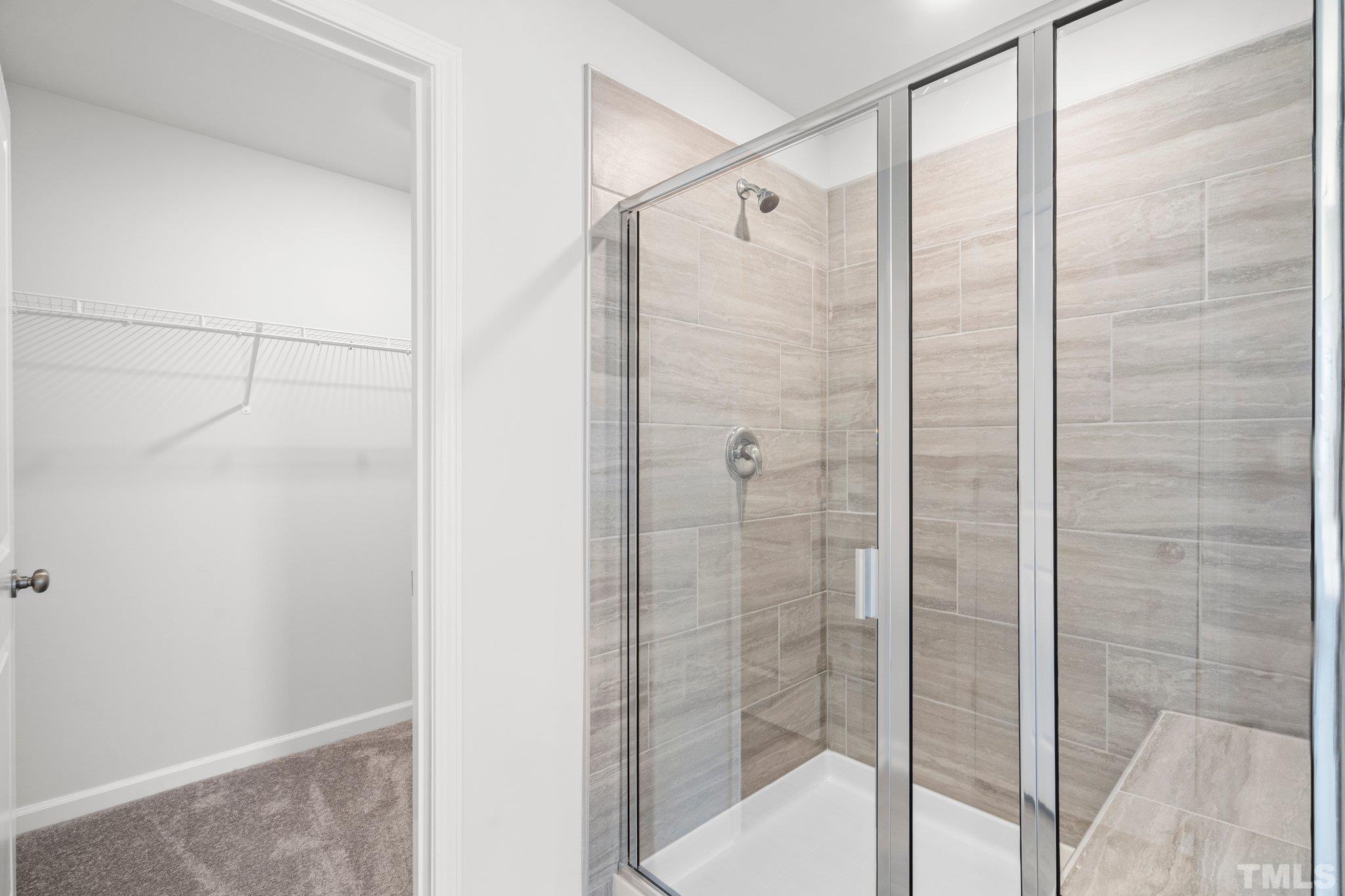 5060 Tura Street Raleigh, NC 27610 - Photo 28 of 50 a bathroom with a shower