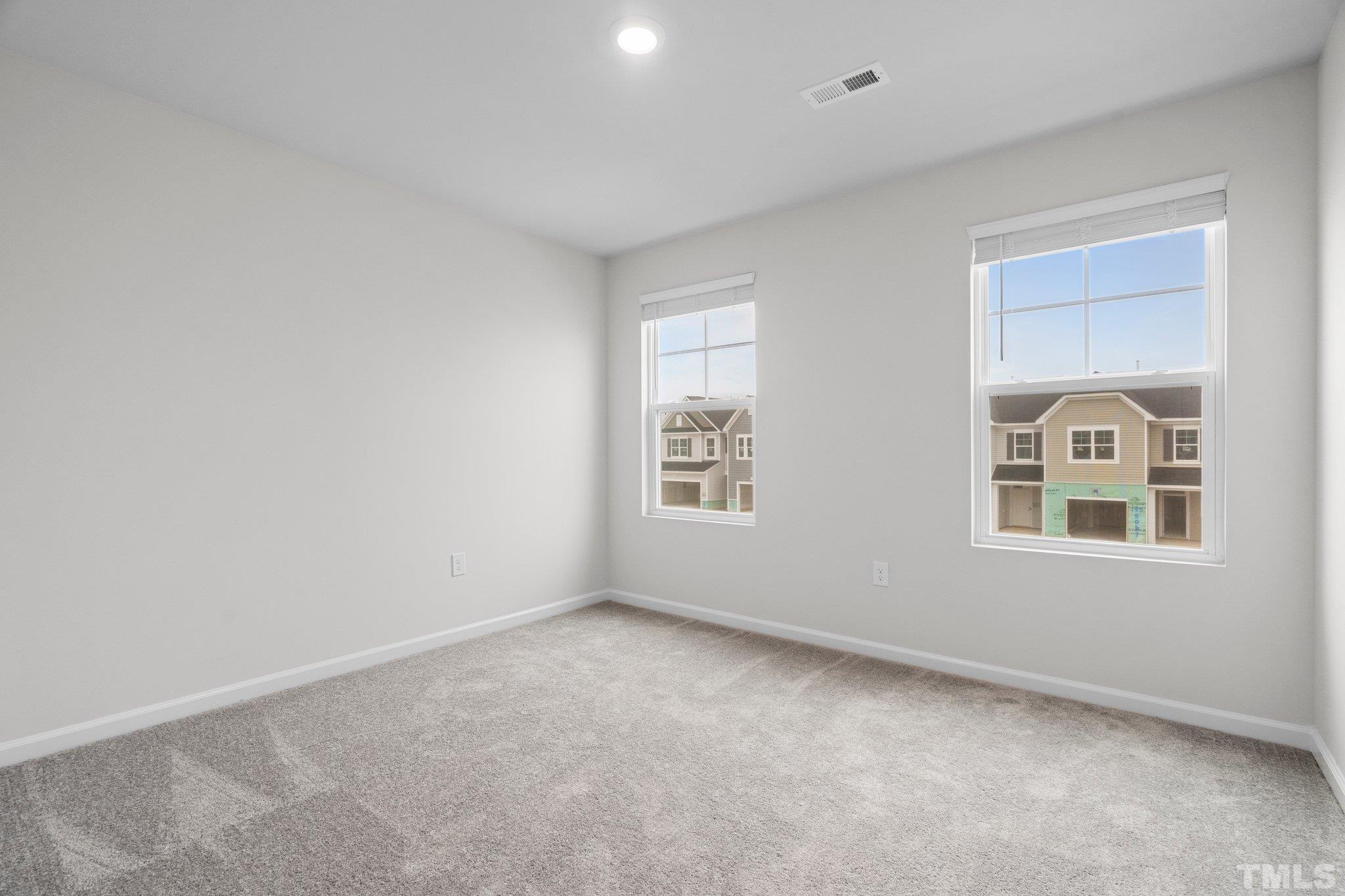 5060 Tura Street Raleigh, NC 27610 - Photo 31 of 50 an empty room with a window
