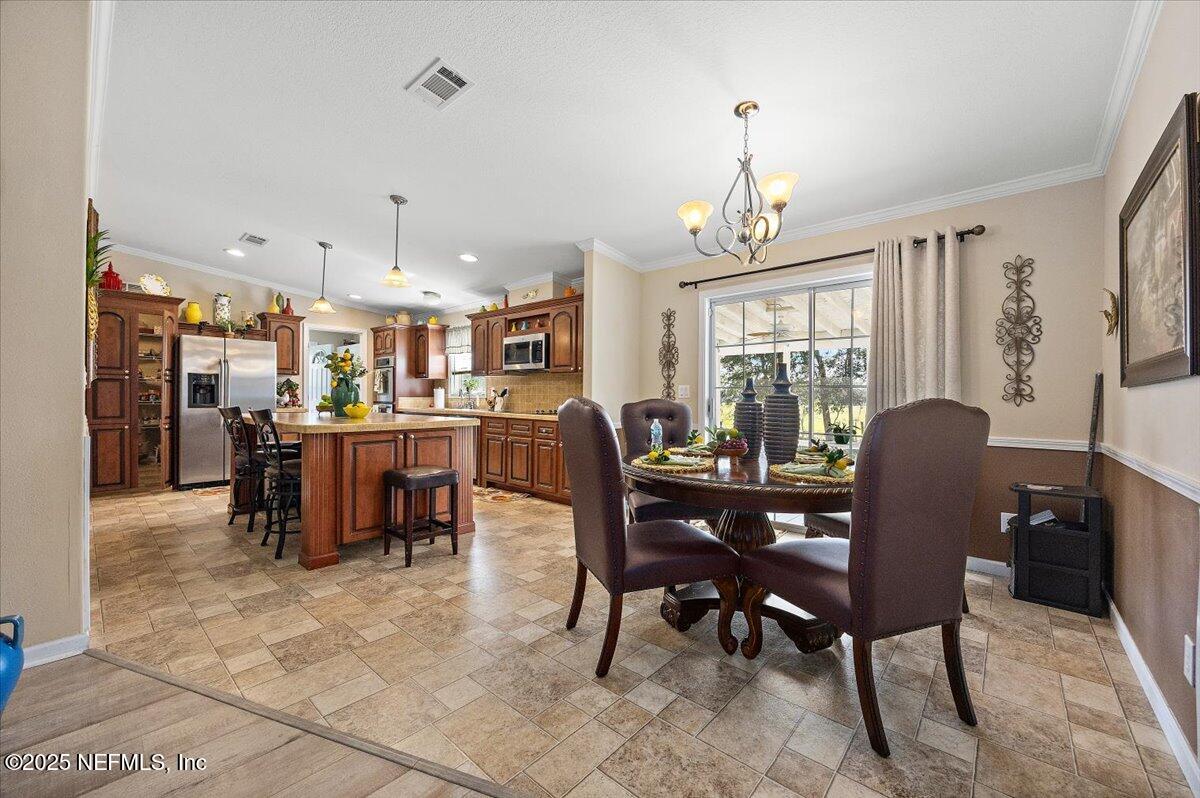 2719 Scully Road Middleburg, FL 32068 - Photo 4 of 24 04-Dining Room to Kitchen
