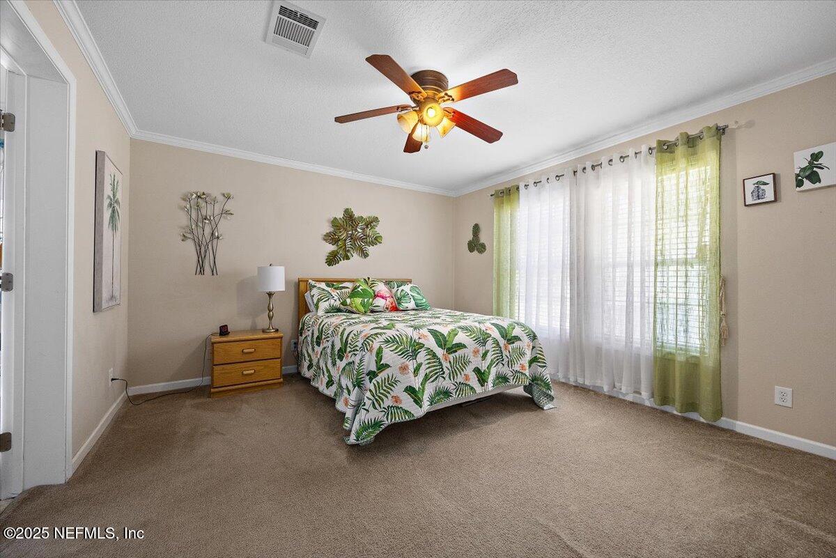 2719 Scully Road Middleburg, FL 32068 - Photo 6 of 24 07-Primary Bedroom