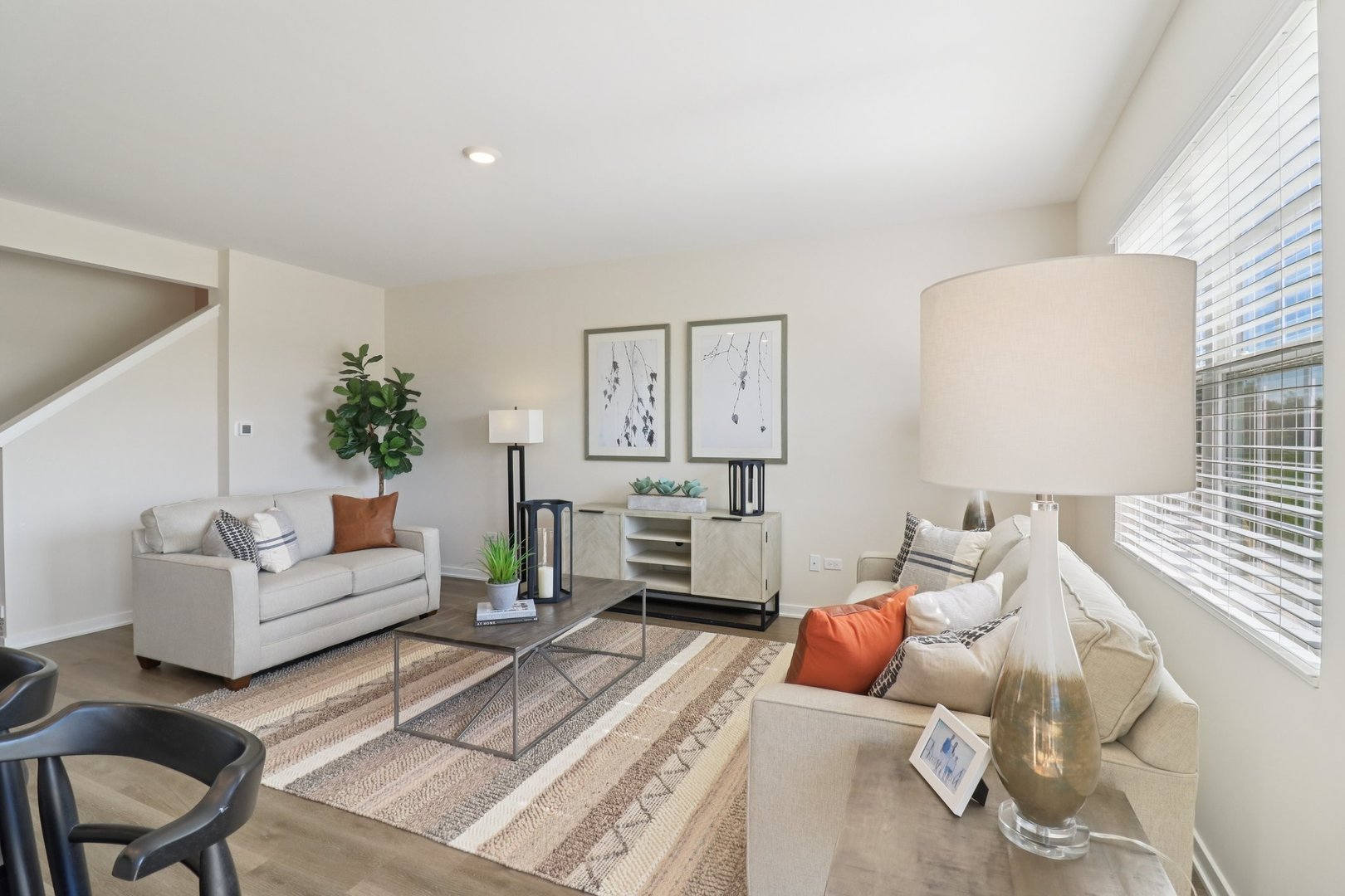 1745 Baler Avenue Aurora, IL 60503 - Photo 9 of 31 a living room with furniture and a table