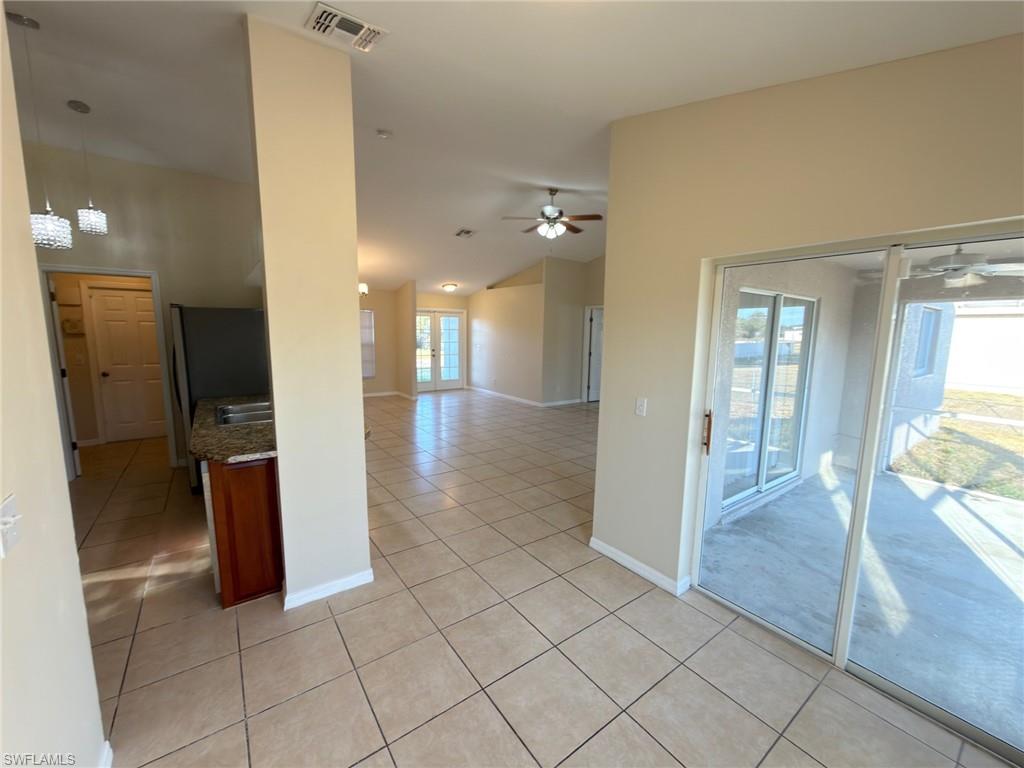 2513 48th Street Southwest Lehigh Acres, FL 33976 - Photo 12 of 22 a view of a hallway