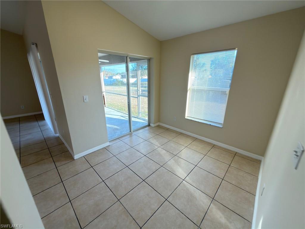 2513 48th Street Southwest Lehigh Acres, FL 33976 - Photo 16 of 22 an empty room with windows