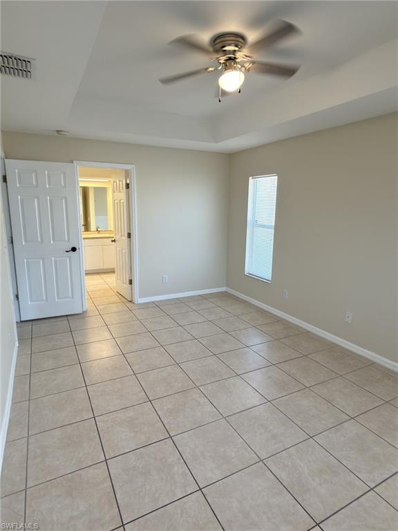 2513 48th Street Southwest Lehigh Acres, FL 33976 - Photo 20 of 22 a view of empty room with a ceiling fan and window