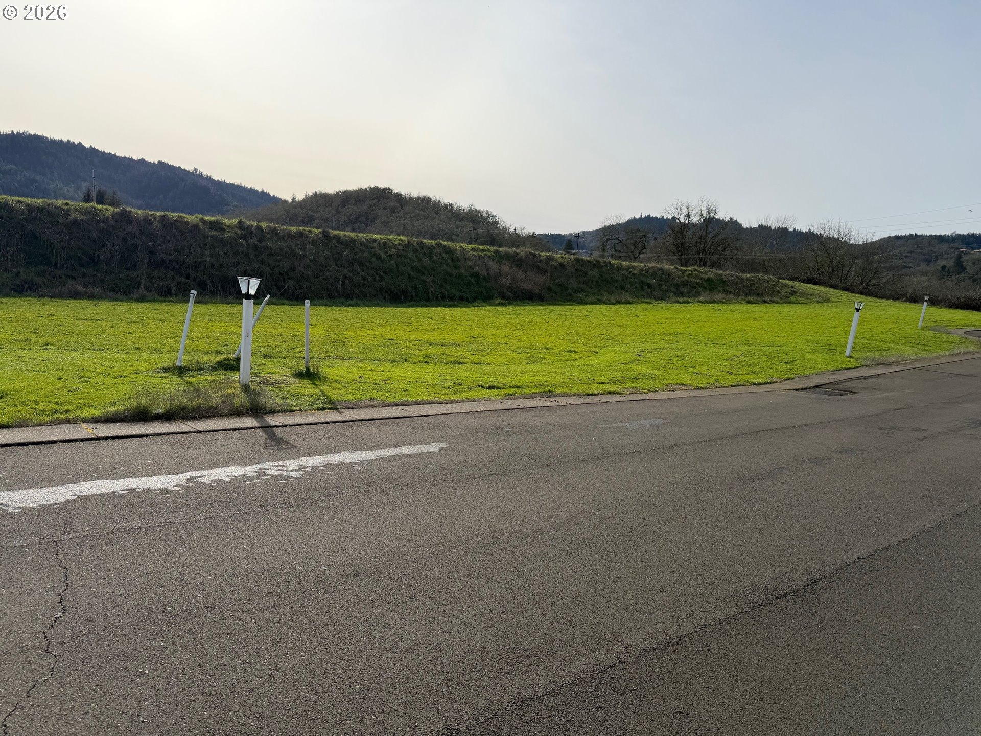 141 West River Ridge Avenue Roseburg, OR 97471 - Photo 20 of 20 a view of a field with a ocean view