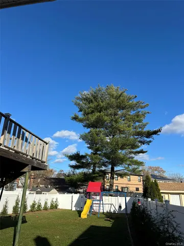 a view of swimming pool with seating space