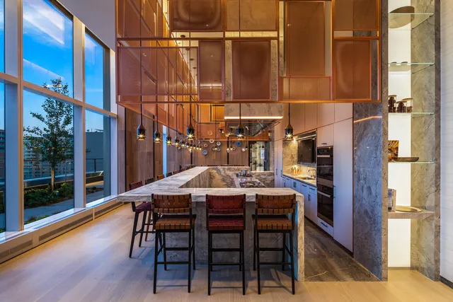 a view of a patio with table and chairs