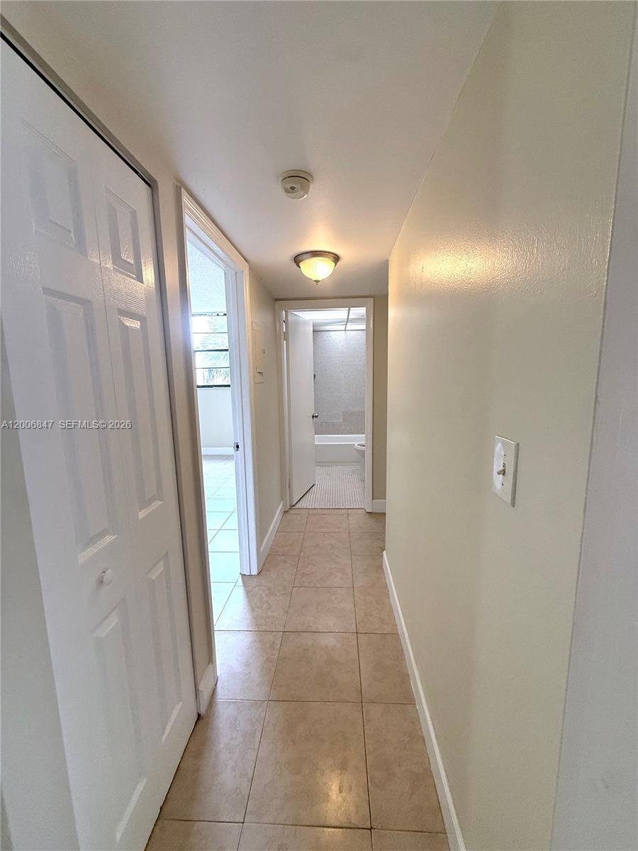 10835 Southwest 112th Avenue, Unit 306 Miami, FL 33176 - Photo 15 of 19 a view of a hallway