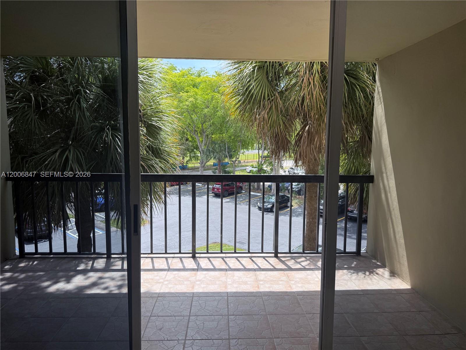 10835 Southwest 112th Avenue, Unit 306 Miami, FL 33176 - Photo 10 of 19 a view of a balcony with an outdoor space