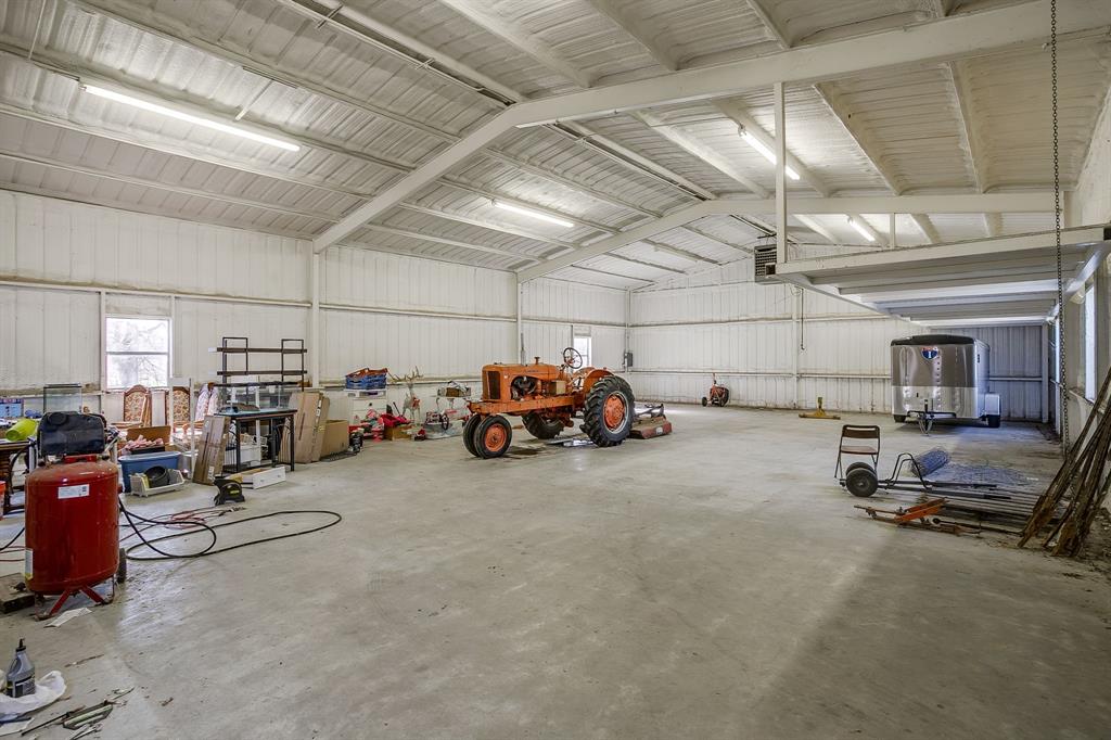 4763 Blue Flat Road Gordon, TX 76453 - Photo 23 of 40 a view of parking garage with cars