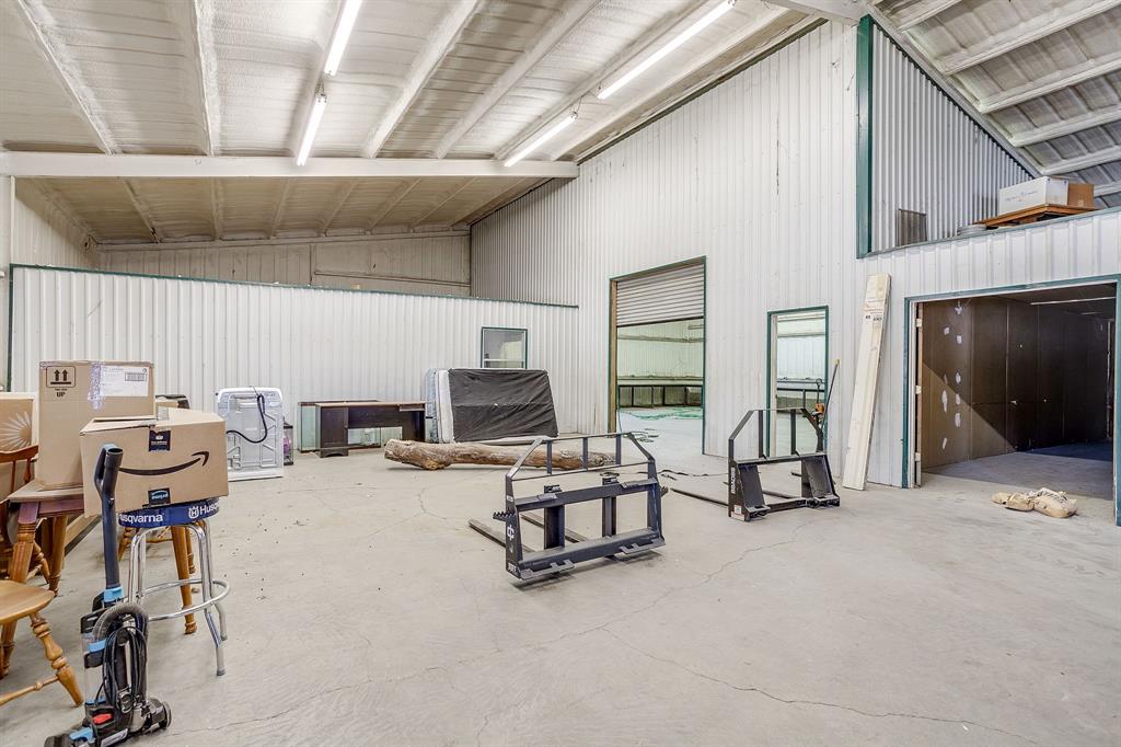 4763 Blue Flat Road Gordon, TX 76453 - Photo 27 of 40 a view of a livingroom with workspace and a window