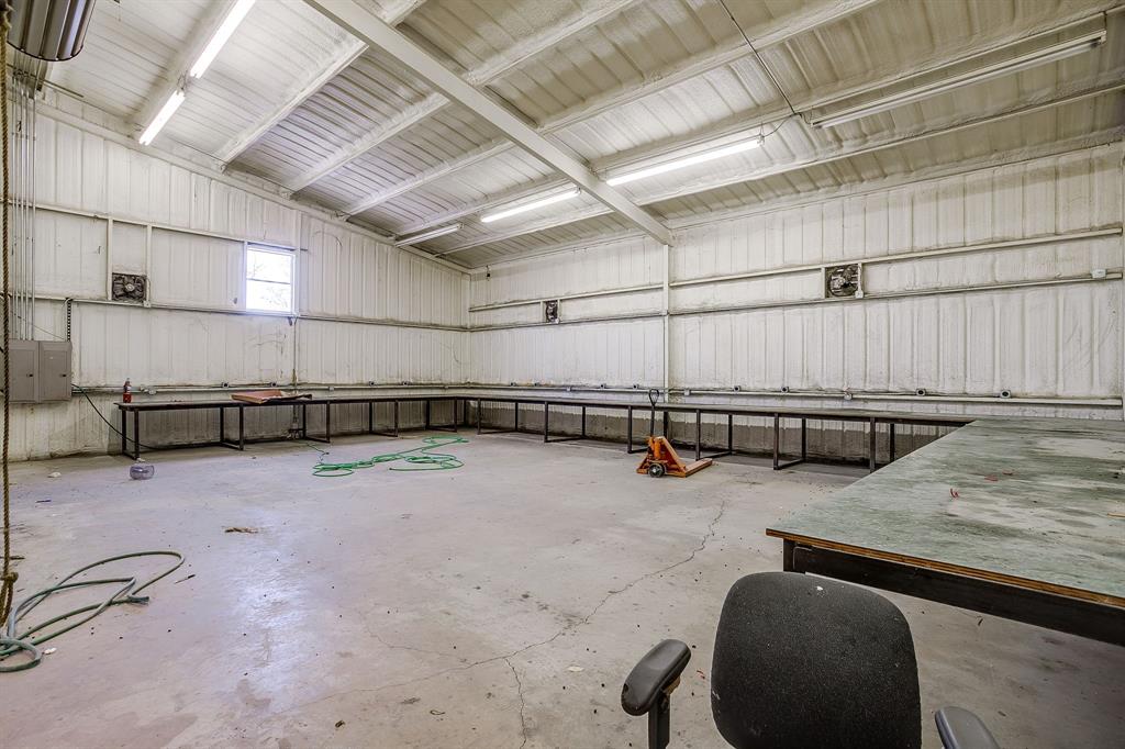 4763 Blue Flat Road Gordon, TX 76453 - Photo 28 of 40 a view of a room with gym equipment