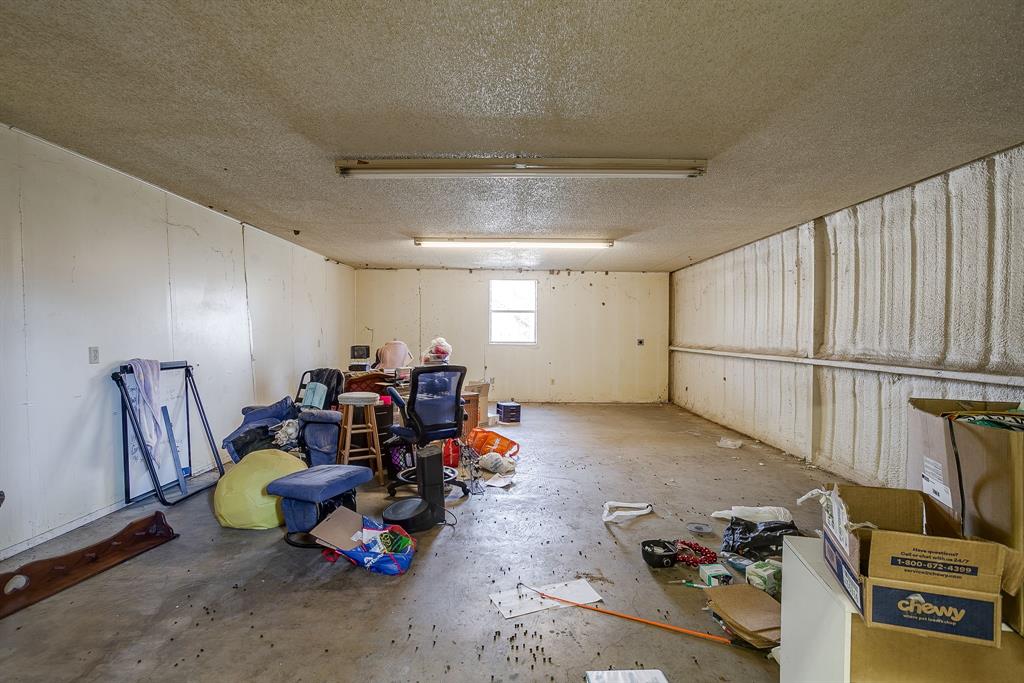 4763 Blue Flat Road Gordon, TX 76453 - Photo 29 of 40 a view of a room with gym equipment