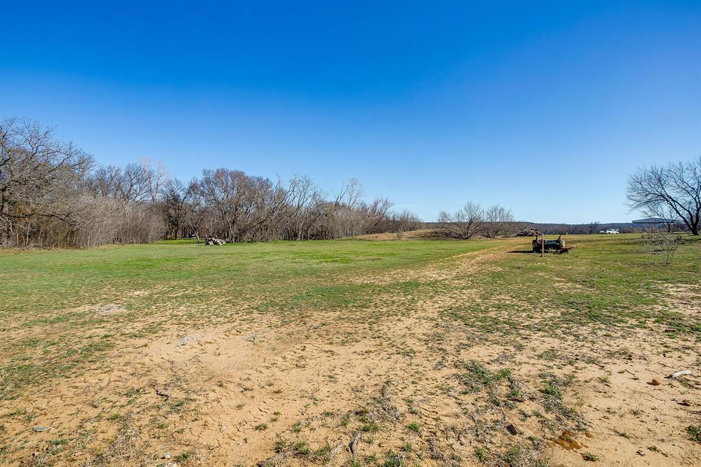 4763 Blue Flat Road Gordon, TX 76453 - Photo 33 of 40 a view of a field with an ocean