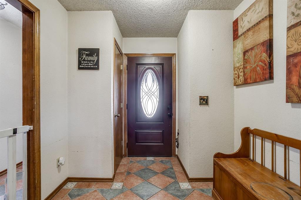 4763 Blue Flat Road Gordon, TX 76453 - Photo 5 of 40 a view of entryway with a rug