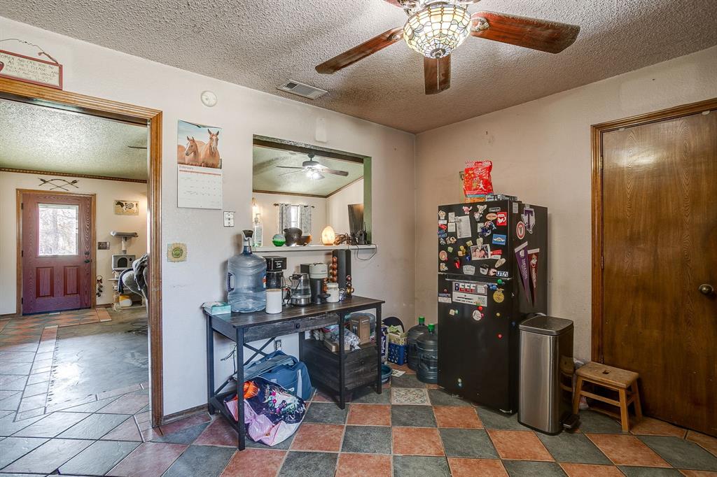 4763 Blue Flat Road Gordon, TX 76453 - Photo 10 of 40 a view of entryway with dining area