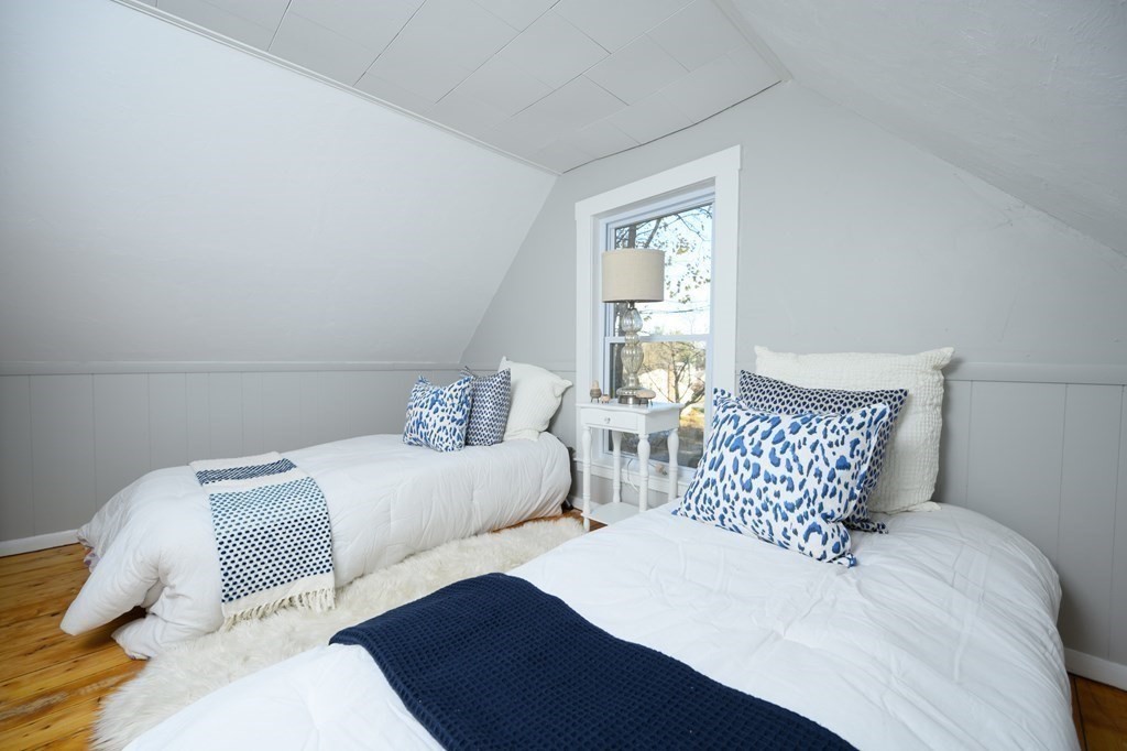 9 Bank Street Abington, MA 02351 - Photo 16 of 16 a bedroom with two beds and painted walls