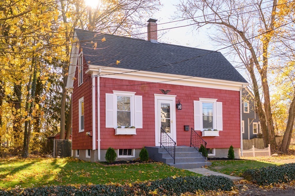 9 Bank Street Abington, MA 02351 - Photo 2 of 16 front view of house with a yard