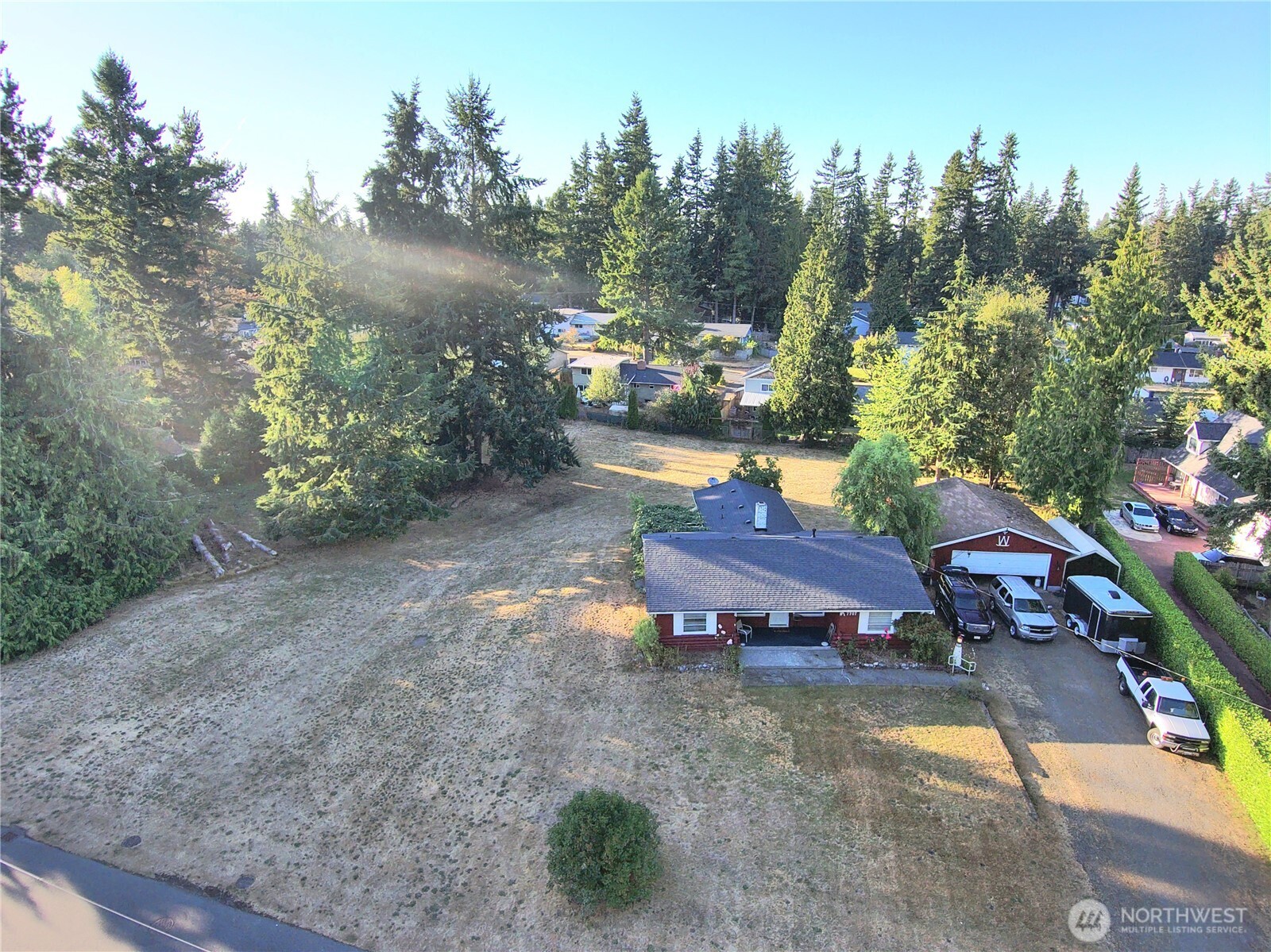 7707 203rd Street Southwest Edmonds, WA 98026 - Photo 19 of 20 a view of a yard with furniture