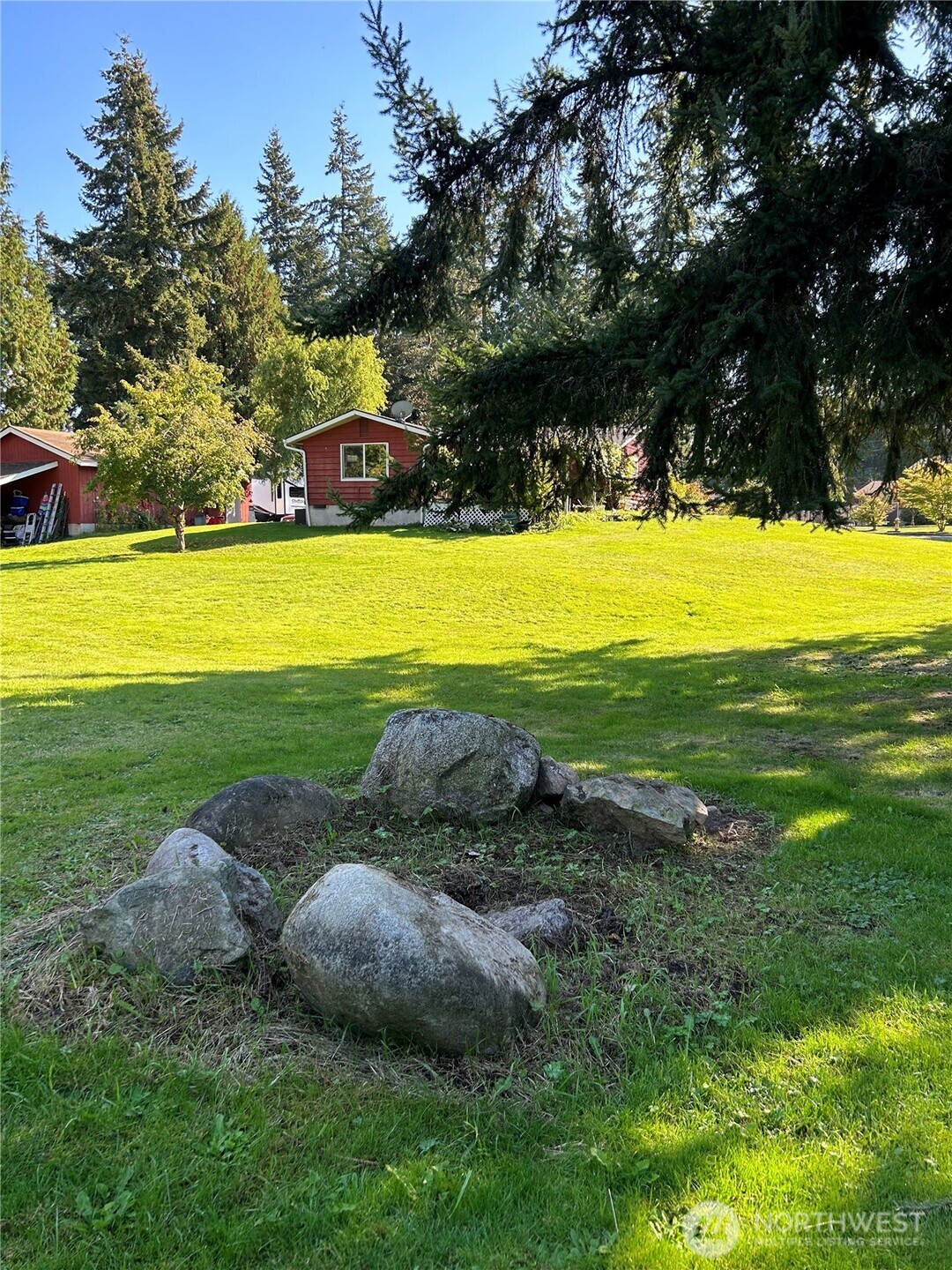 7707 203rd Street Southwest Edmonds, WA 98026 - Photo 10 of 20 a view of a swimming pool with an outdoor space and seating area