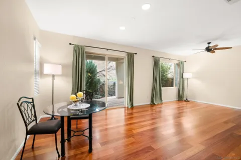 a view of a livingroom with furniture and wooden floor