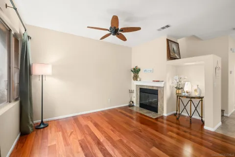 a bedroom with a bed and a fireplace