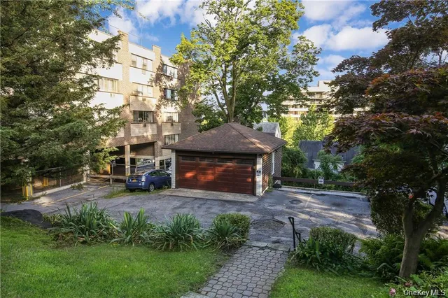 a view of a car parked in front of house