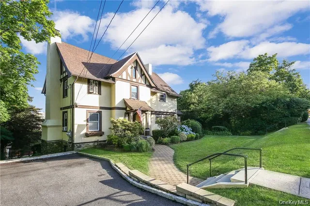 a front view of a house with porch