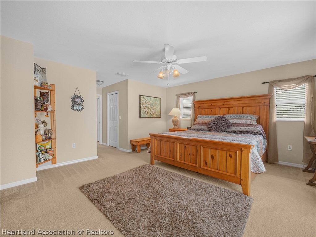 5721 Golden Road Sebring, FL 33875 - Photo 15 of 42 His and Hers walk-in closets