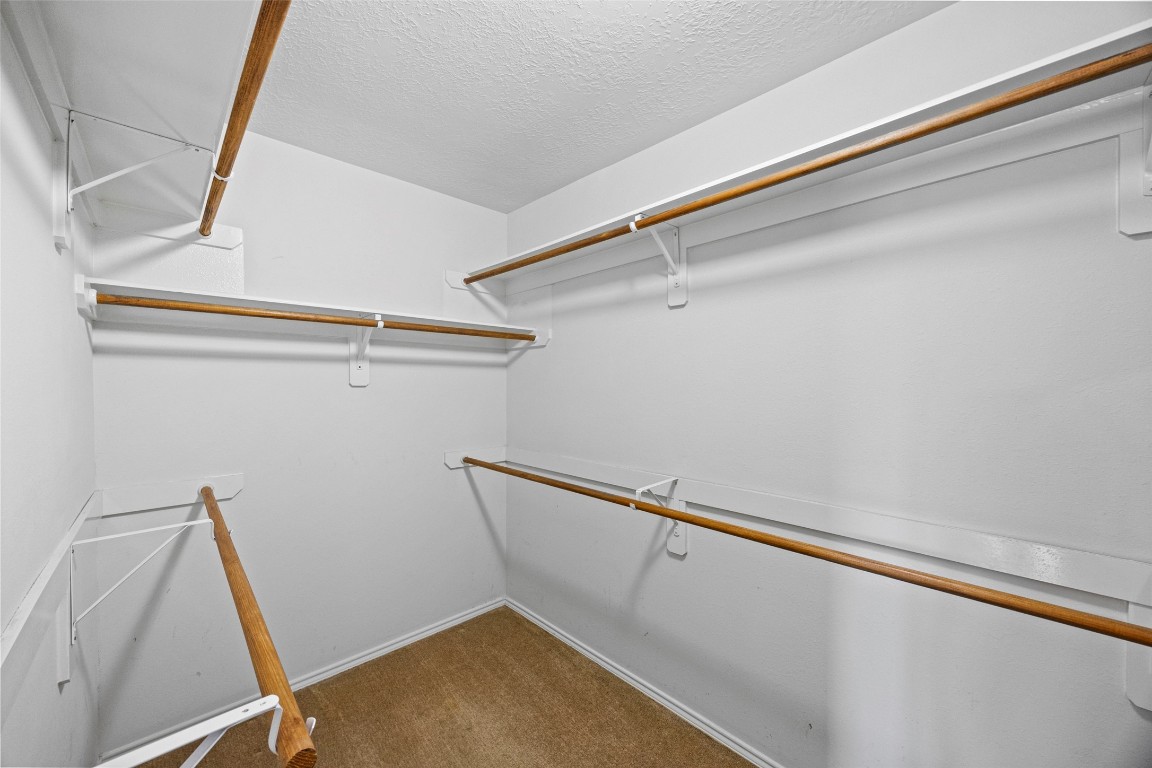 9510 Barr Spring Drive Humble, TX 77396 - Photo 22 of 27 a view of a room with rack on the wall