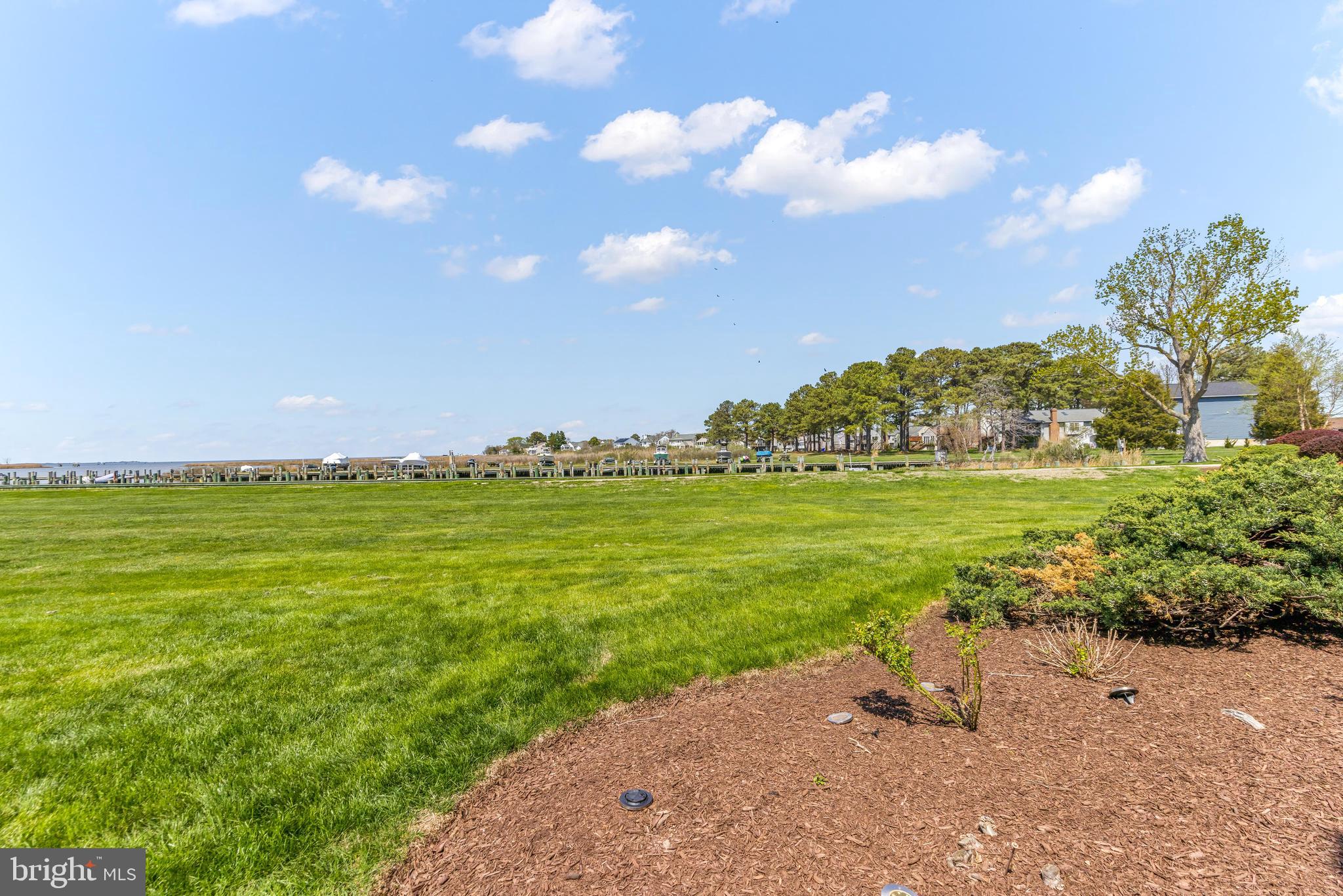 121 Bay View Grasonville, MD 21638 - Photo 54 of 66 a view of an ocean with beach and outdoor space