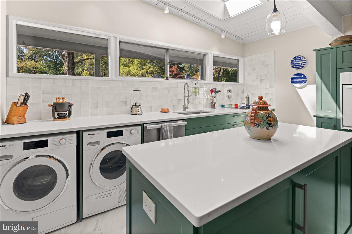 75 Clover Lane Princeton, NJ 08540 - Photo 12 of 37 a view of kitchen sink and wooden floor
