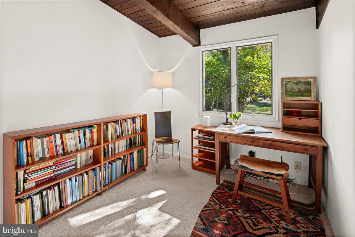 75 Clover Lane Princeton, NJ 08540 - Photo 23 of 37 a room with furniture a rug and a window