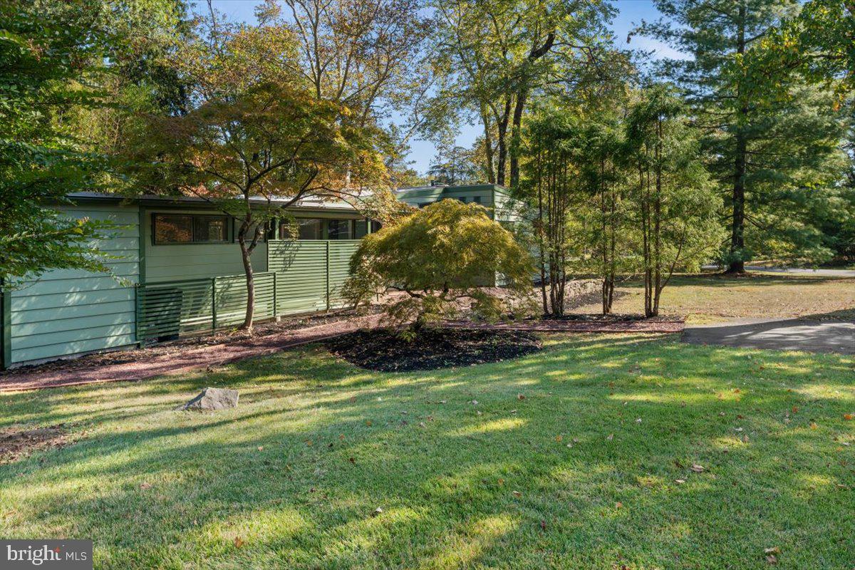 75 Clover Lane Princeton, NJ 08540 - Photo 31 of 37 a view of a backyard with large trees