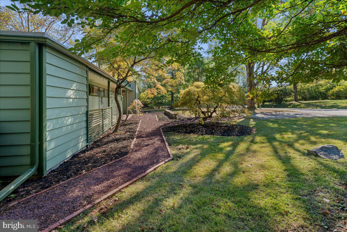 75 Clover Lane Princeton, NJ 08540 - Photo 37 of 37 a view of a backyard with plants