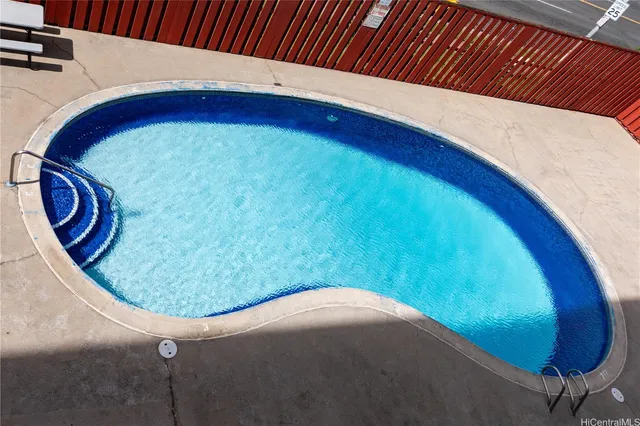 a view of staircase with washer and dryer