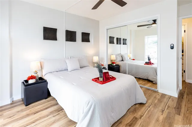 a bedroom with bed and window