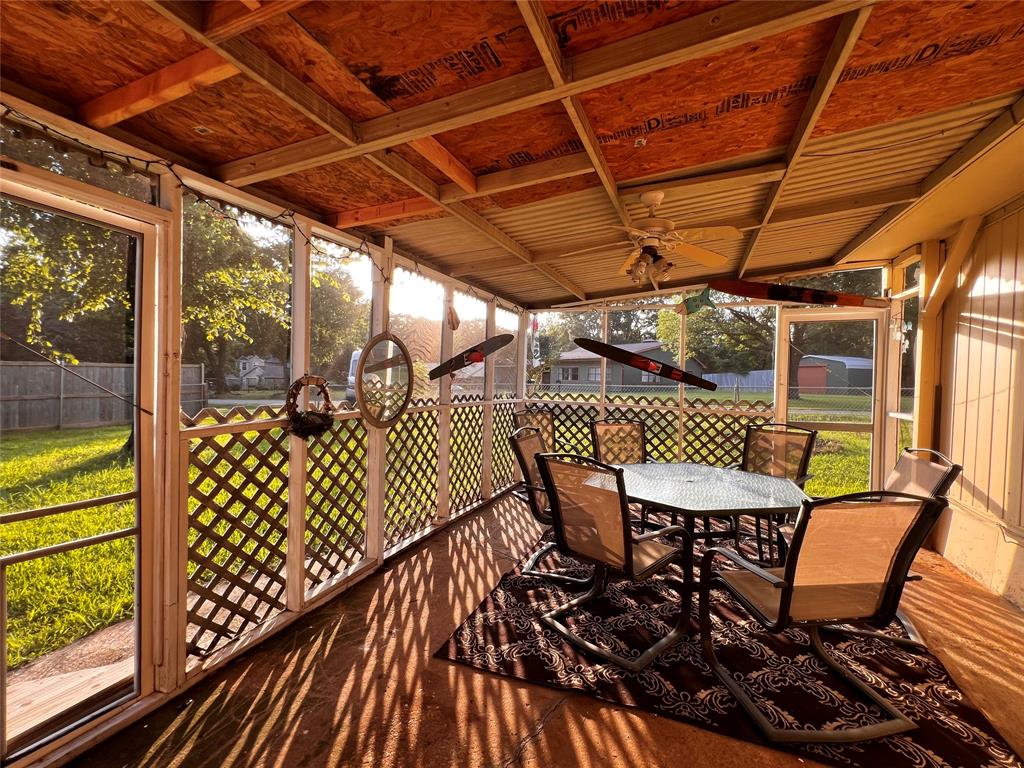 1036 Paradise Cove Road Pottsboro, TX 75076 - Photo 16 of 40 a view of a chairs and table on the deck