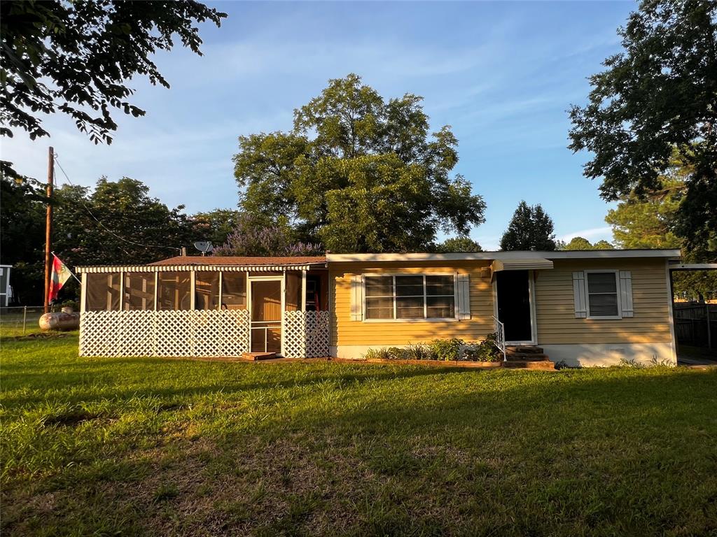 1036 Paradise Cove Road Pottsboro, TX 75076 - Photo 20 of 40 a front view of house with yard and green space