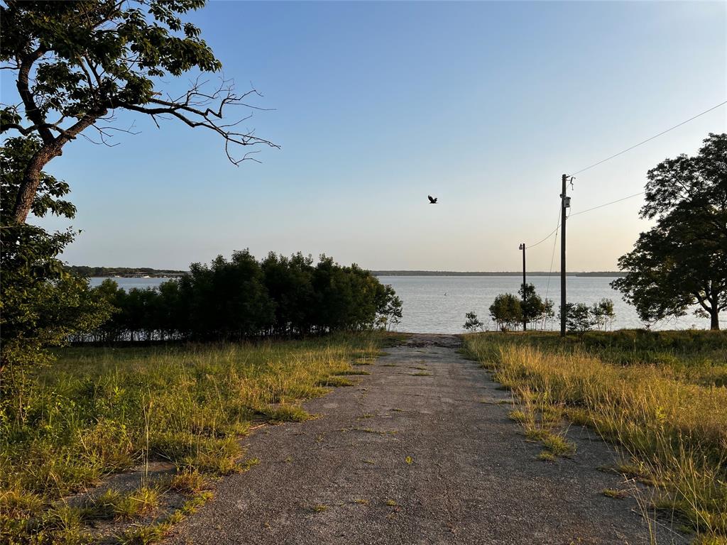 1036 Paradise Cove Road Pottsboro, TX 75076 - Photo 25 of 40 a view of a ocean with boats in the background