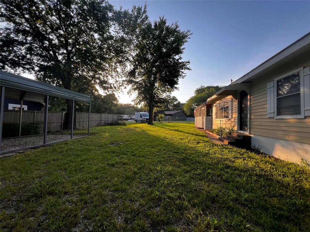 1036 Paradise Cove Road Pottsboro, TX 75076 - Photo 32 of 40 a view of backyard with green space